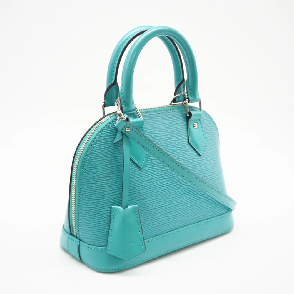 Louis Vuitton Alma Handbag blue leather